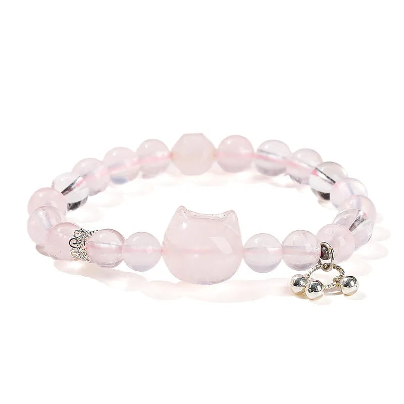 Women's natural crystal bracelet collection showing nine different designs including cat head, bear, and snowflake motifs