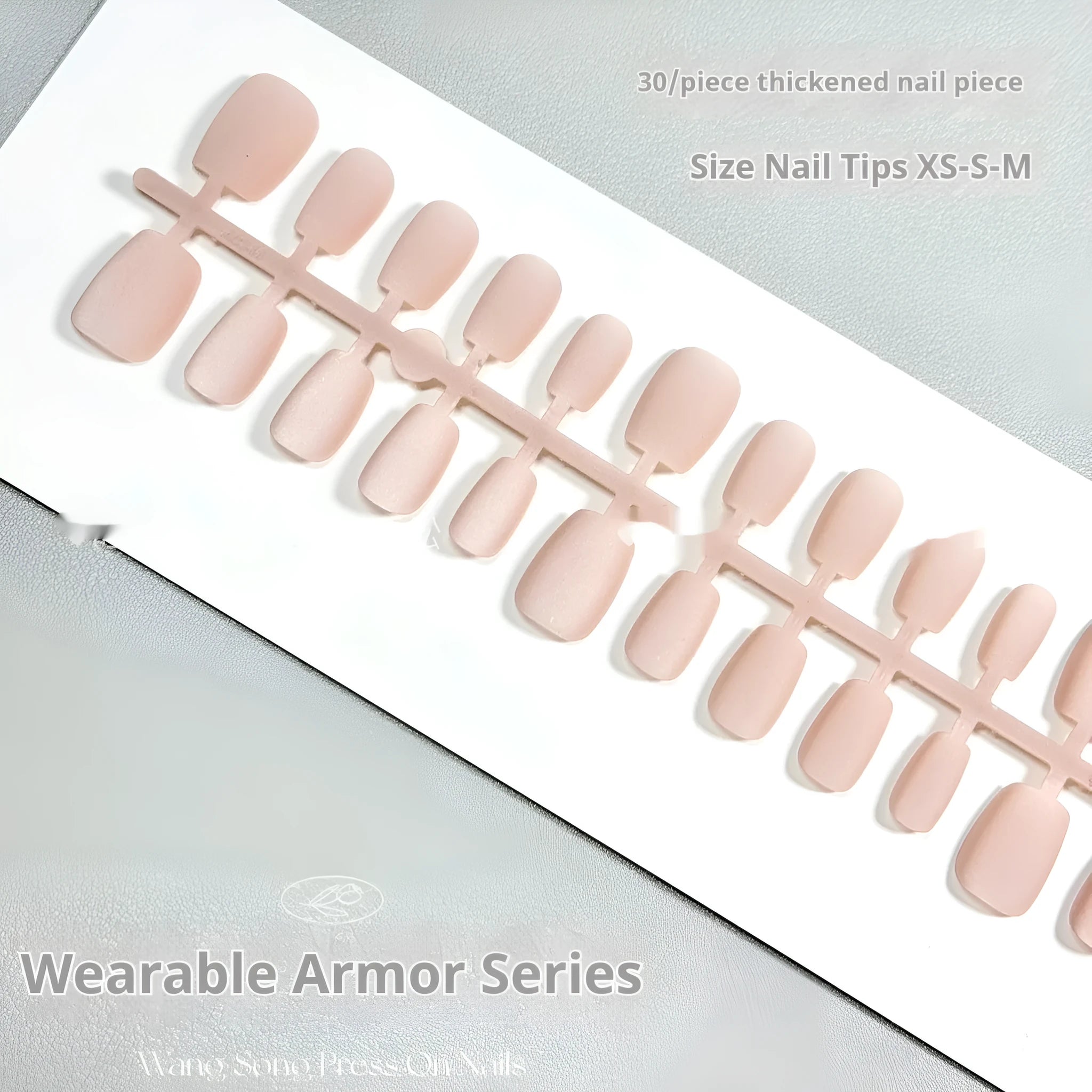 Set of frosted velvet false nails with Cat's Eye effect in short ladder sizes XS, S, and M.
