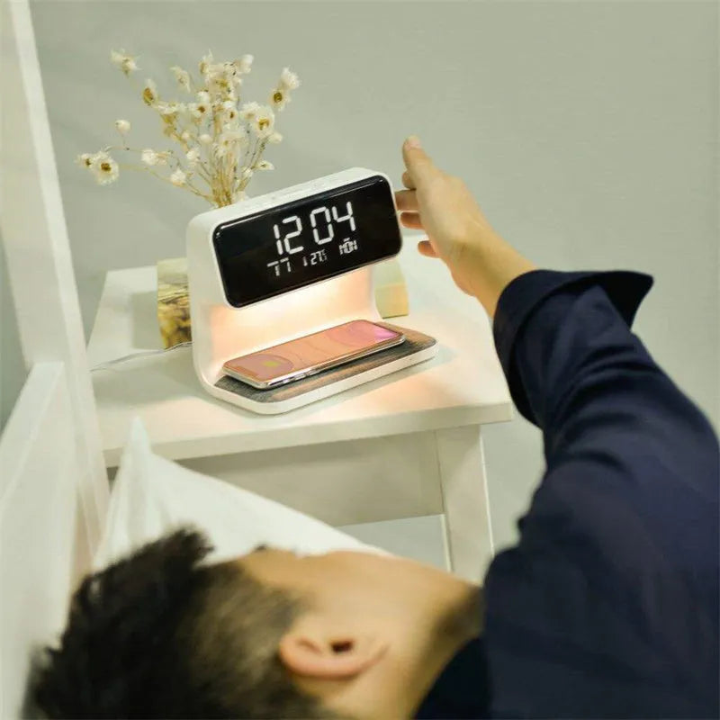 White 3-in-1 bedside lamp with wireless charging pad, LCD screen clock, and touch dimming.