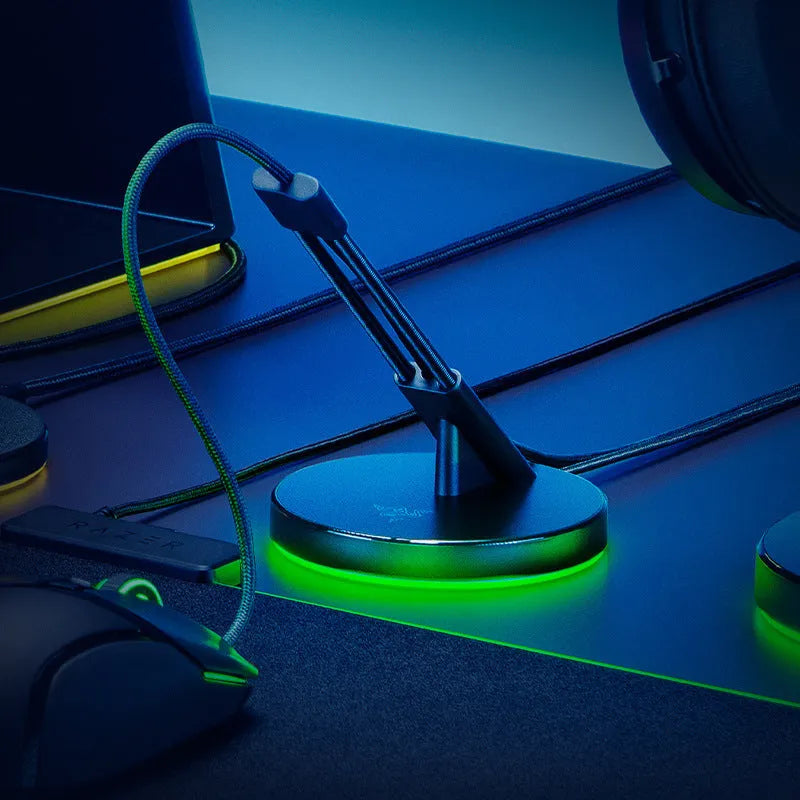 Thunder Snake mouse cable fastener with RGB lighting on a gaming desk