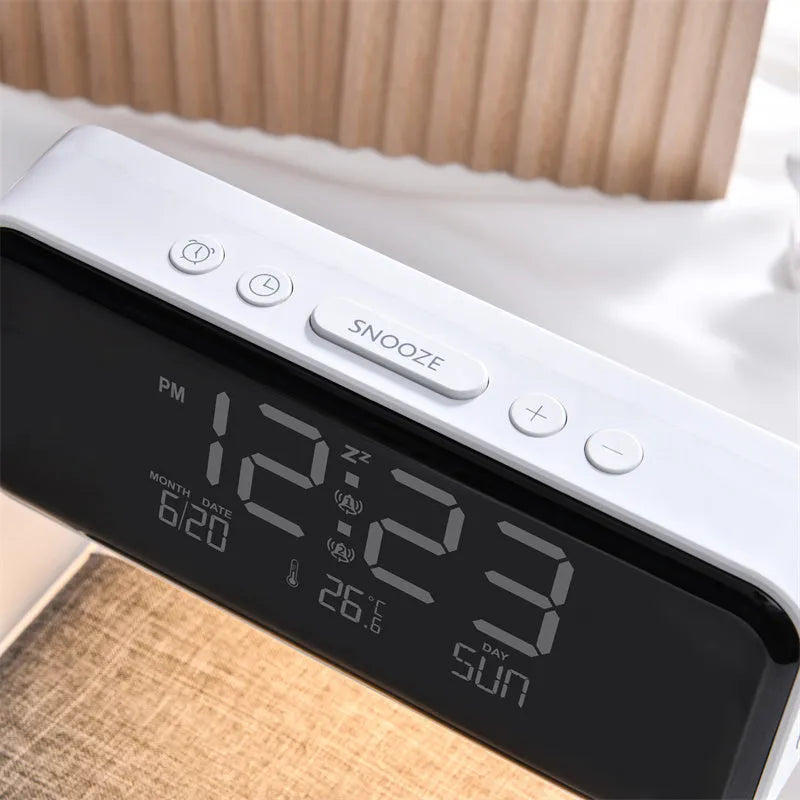 White 3-in-1 bedside lamp with wireless charging pad, LCD screen clock, and touch dimming.