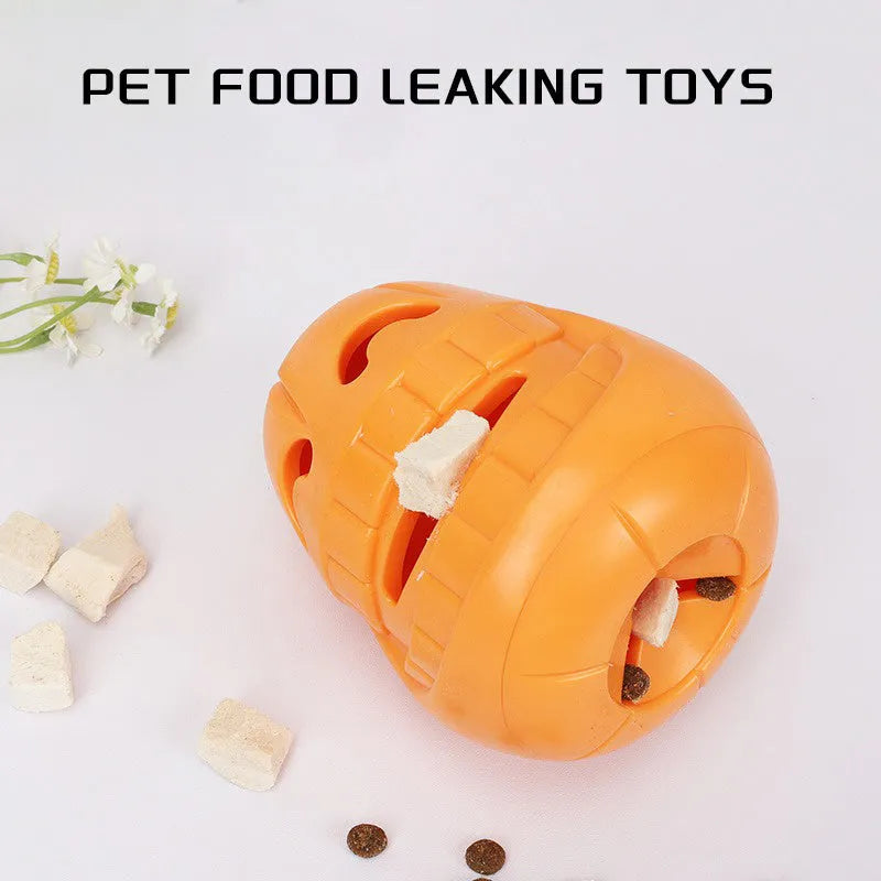 Orange Halloween pumpkin shaped interactive dog chew toy with treat-dispensing funnel