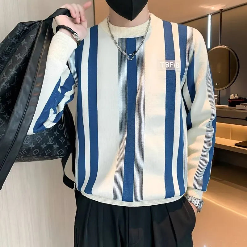 Blue and white contrast stripe long-sleeved pullover sweater, loose fit knitwear with V-neck.