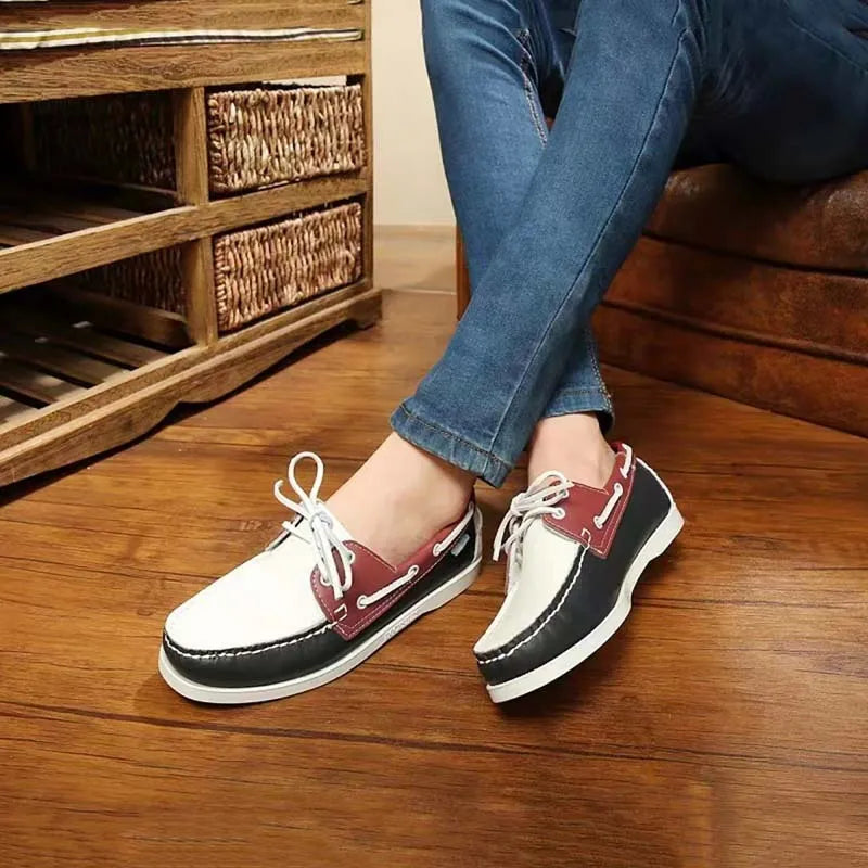 Men's British style casual shoe with round toe and flat heel, shown in a solid colour.