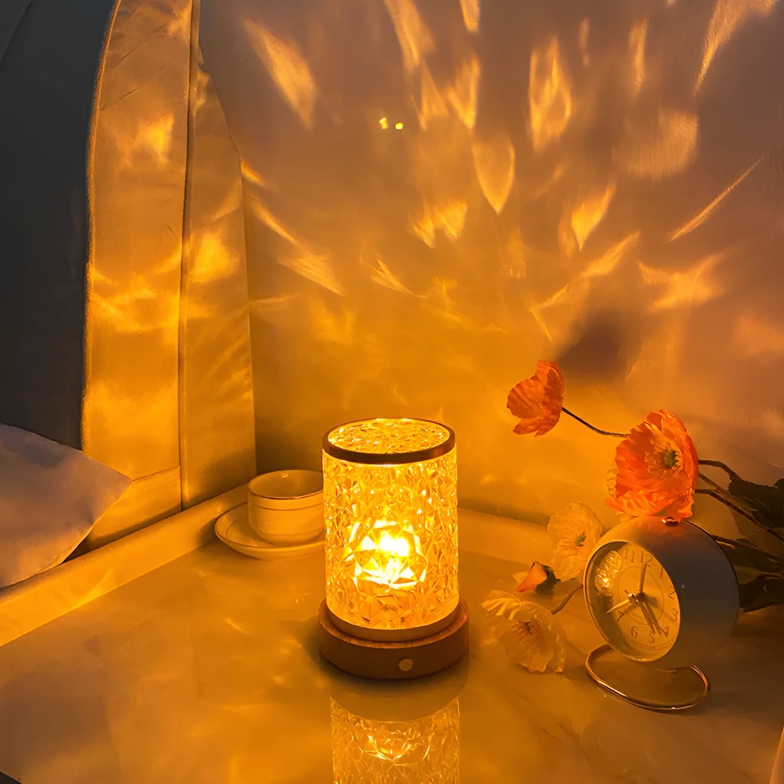 Rotating water ripple night light on solid wood base showing touch control and USB connection