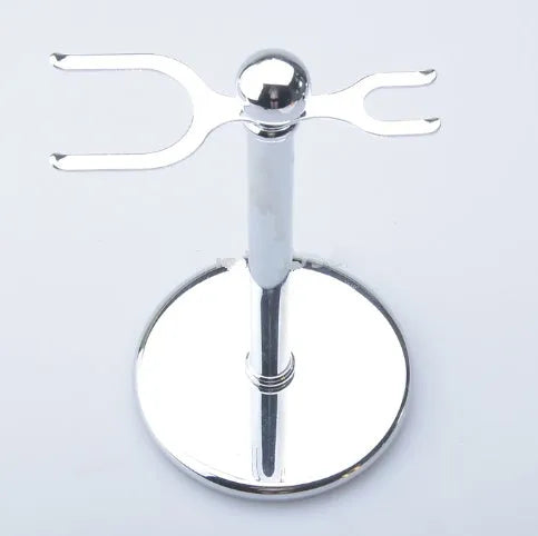 CSB men's shaving set with chrome stand holding a double-edge razor and badger hair brush, plus soap bowl and blades.