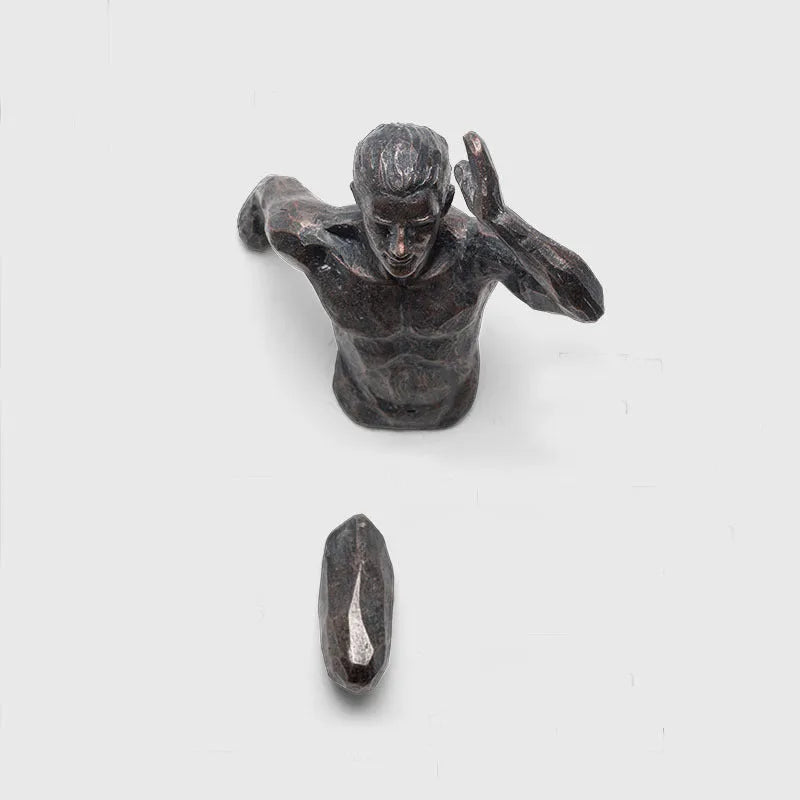 Minimalist metallic resin character sculpture wall hanging in copper finish.
