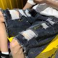 Men's water washed hole detail denim shorts in loose fit fifth length design
