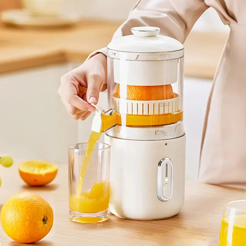 Portable electric citrus juicer in fresh green with USB charging cable and cleaning brush