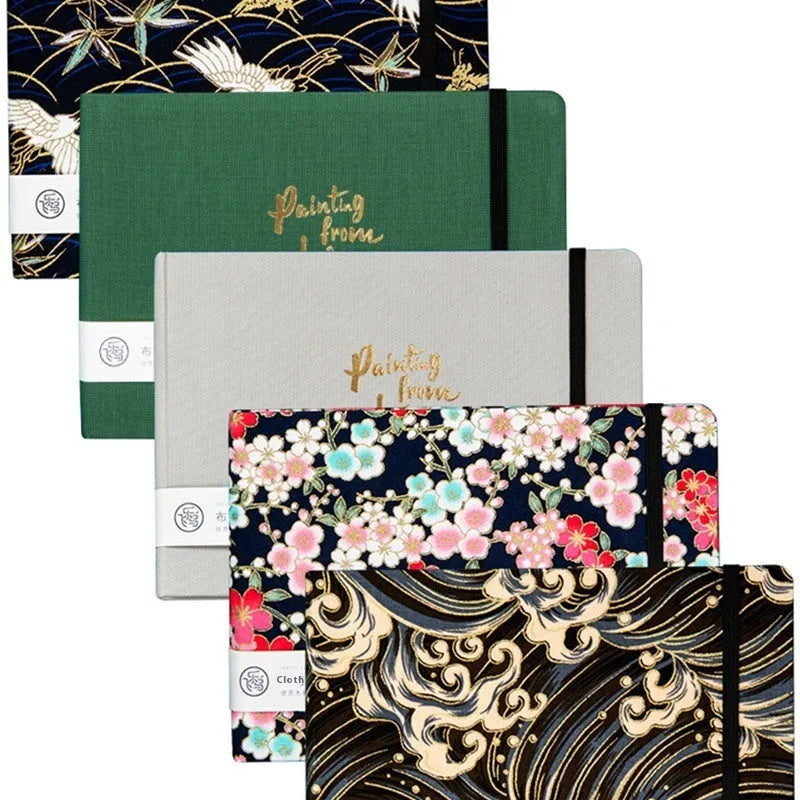 Fabric-bound handmade watercolour notebook with artistic cover design for character sketching