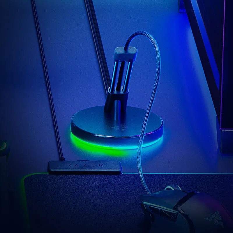 Thunder Snake mouse cable fastener with RGB lighting on a gaming desk