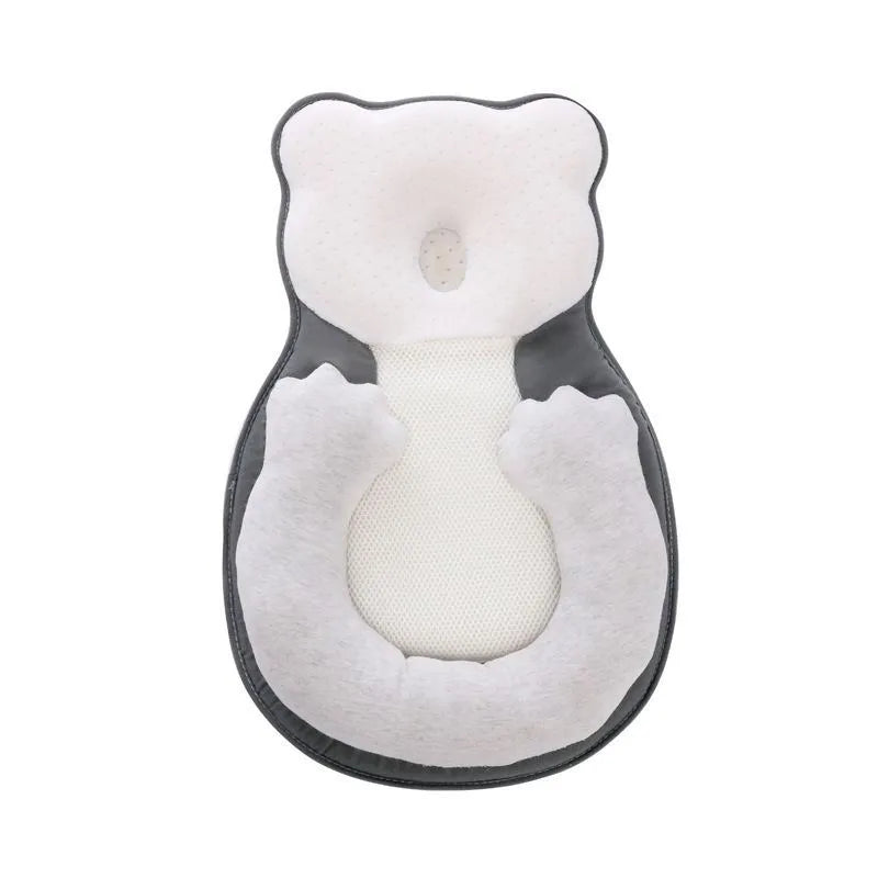 Portable baby flat sleep pillow with soft cotton surface in multiple colour options on a neutral background.