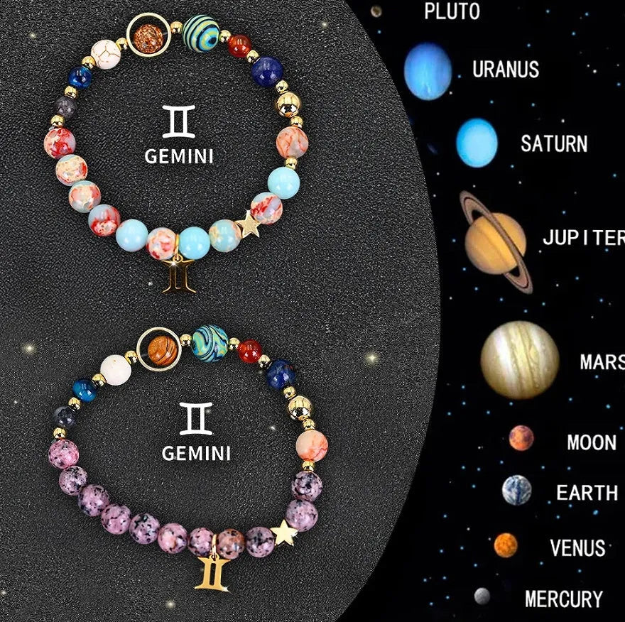 Set of two natural stone beaded bracelets showing zodiac sign symbols.