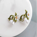 Flower-shaped women's earrings with sterling silver needle details and dual stud/clip wearing options