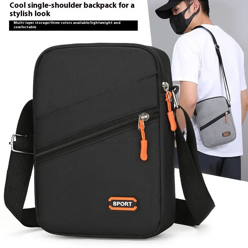 Ultra light Oxford cloth crossbody commuter bag in silver grey, black or navy blue.