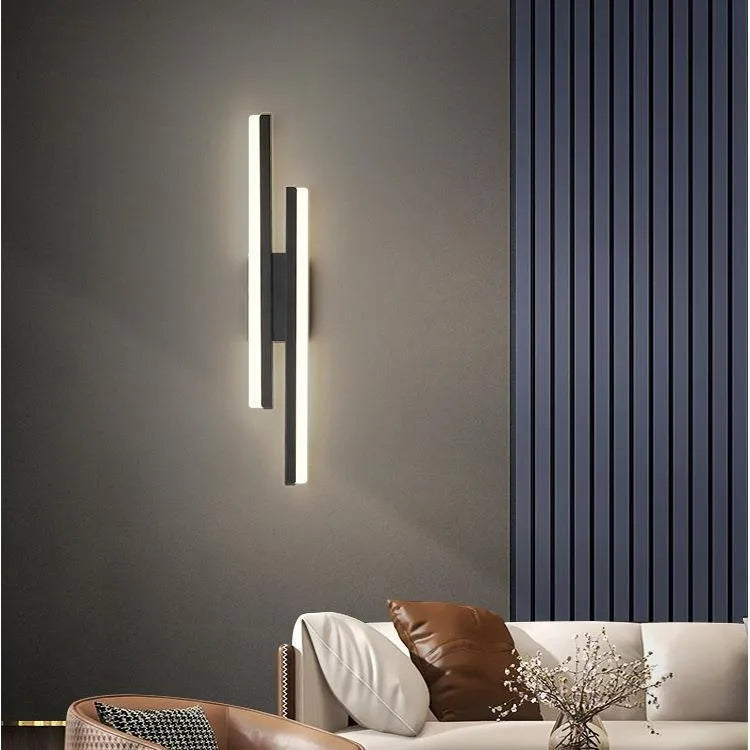 Scandinavian minimalist LED wall light with circular acrylic shade and adjustable arm mounting