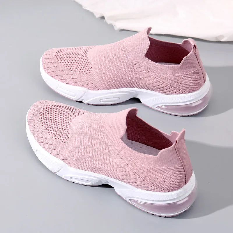 Breathable slip-on sock shoes in black, pink, khaki, and white colours with mesh lining and PVC sole.