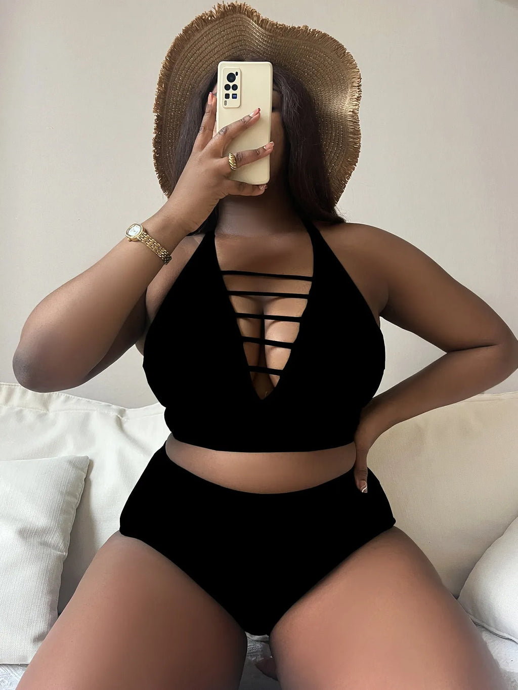 Plus size women's black bikini with adjustable halter top and high waist briefs