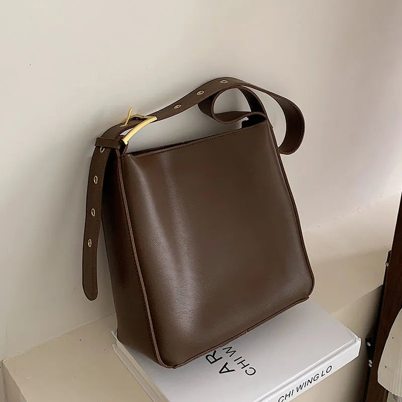 Women's soft PU shoulder messenger bag in black with sandwich zipper compartment, lightweight casual travel crossbody