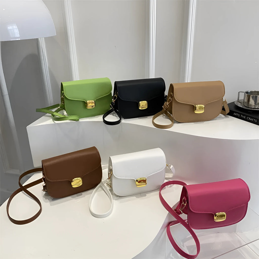 Simple PU women's handbag in khaki colour with internal phone and change pockets.