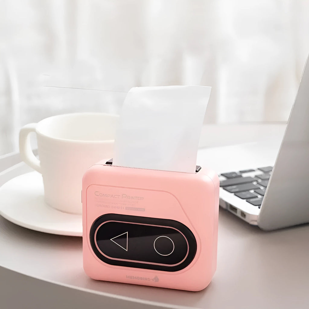 Avocado Green Bluetooth pocket thermal mini printer next to a mobile phone