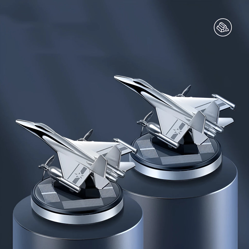 Solar powered rotating aluminium alloy fighter jet perfume ornament in silver, gold, blue, or red colour.