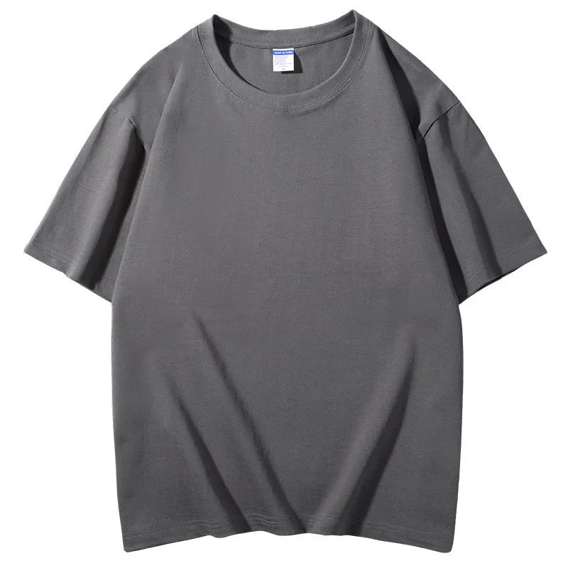 Man wearing a loose-fit 300g cotton round neck t-shirt with a print, shown in a solid colour.