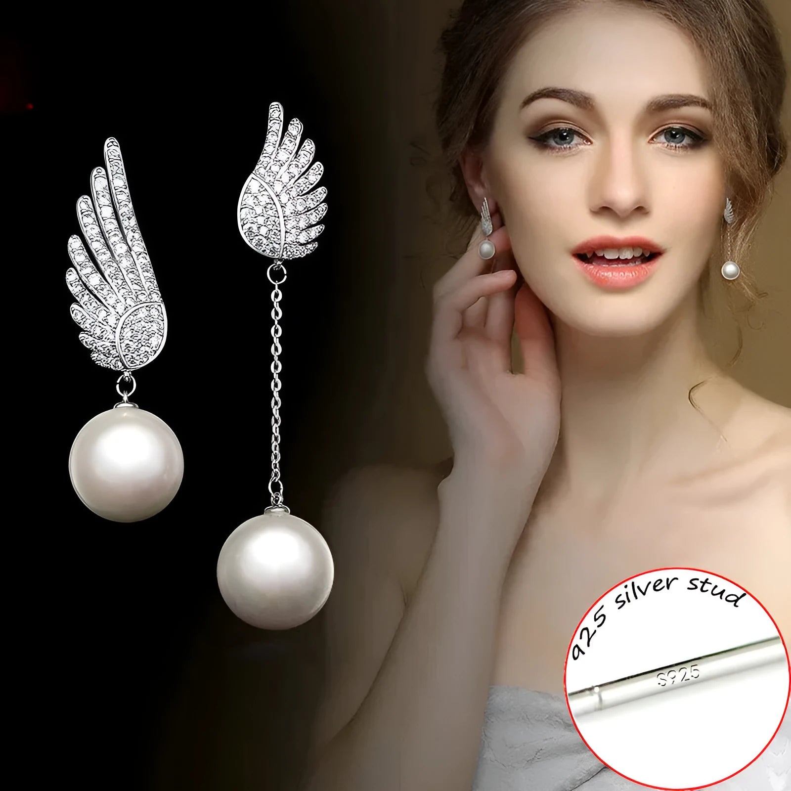 A pair of silver angel wing earrings with diamond treatment and gold-plated gemstone inlays on a platinum-colour finish.