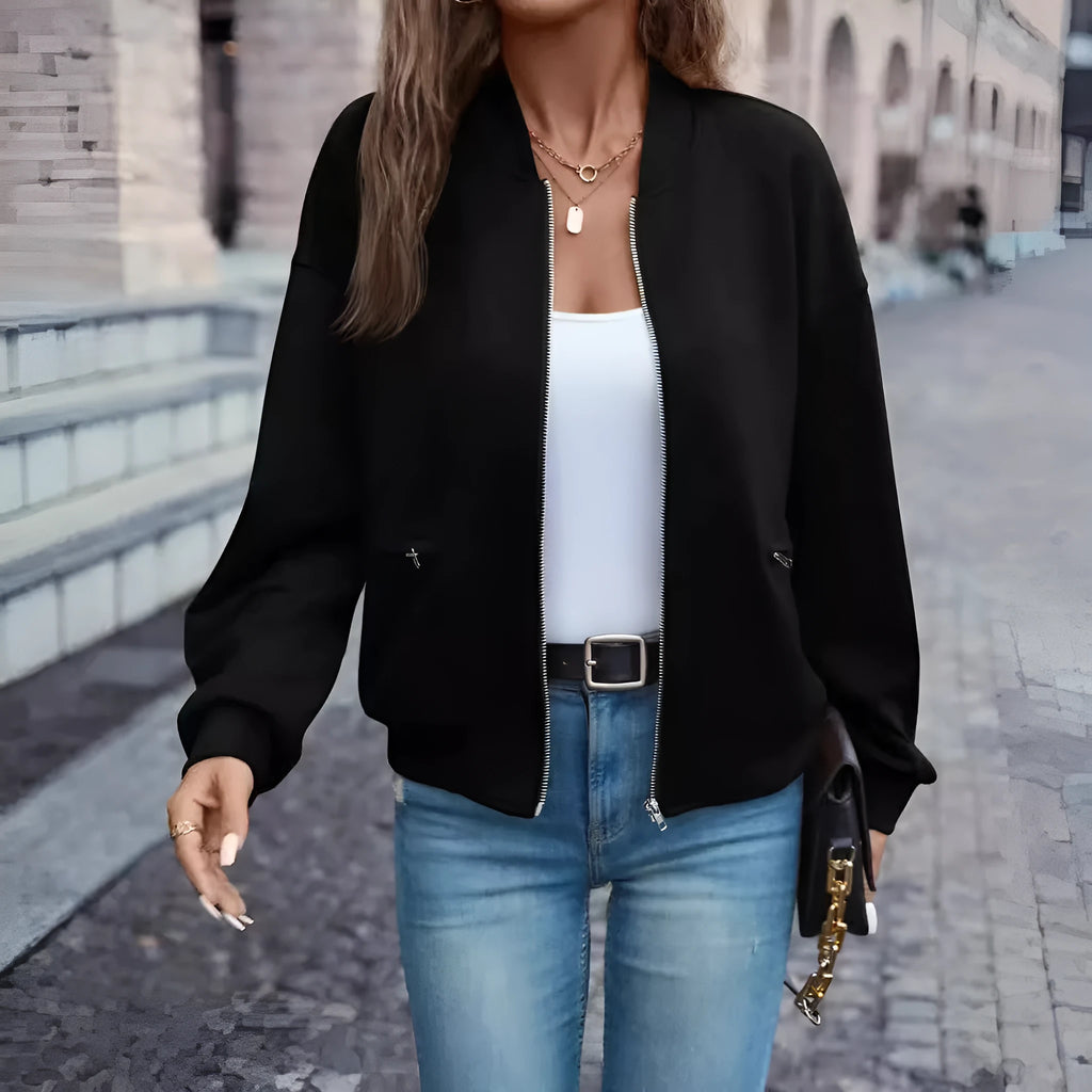 Women's solid black faux pocket zip jacket with long sleeves for casual autumn winter wear