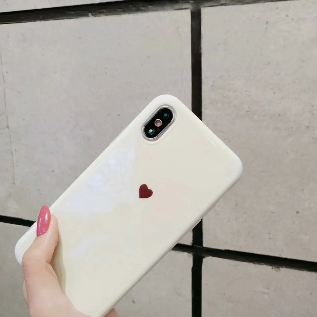 Slim white hard back cover case for iPhone X, shown next to a Bluwhite variant.