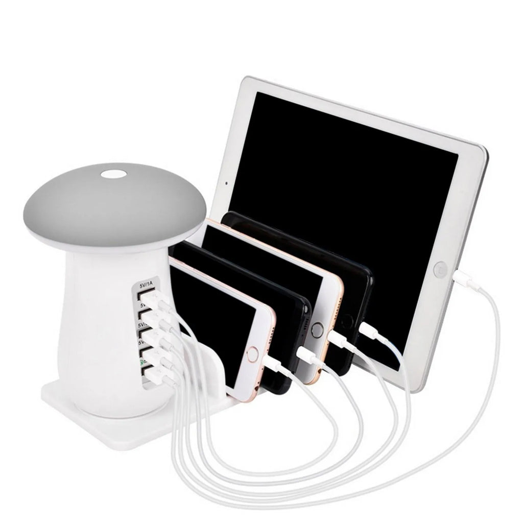 White USB charging station with five ports and mushroom-shaped LED desk lamp for multi-device charging