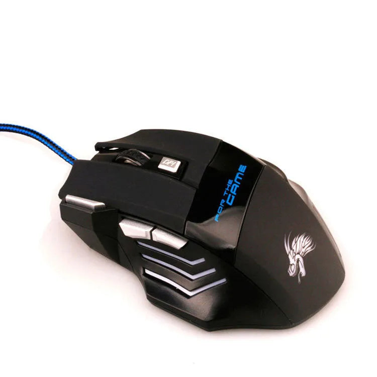 Black wired USB gaming mouse with colourful LED lights and Tyrannosaurus Rex graphic on a desk