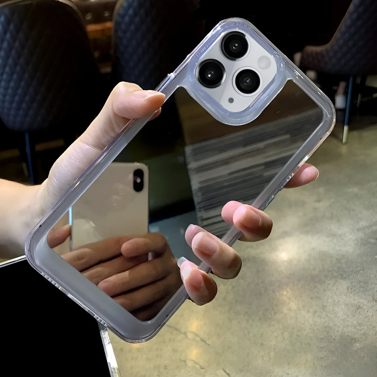 iPhone 15 makeup mirror phone case in silver mirror finish with soft rubber acrylic cover