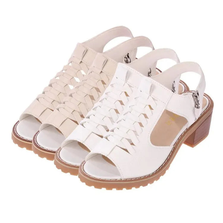 Retro women's sandals with a side zipper in black, shown on a foot, featuring a middle heel.