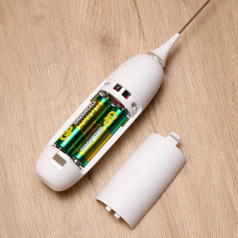 Electric hand-held milk frother blender in black and white colour options on a kitchen counter.