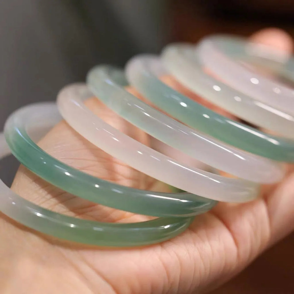 Chalcedony jade bracelet showing natural stone colour and texture, displayed with size markers