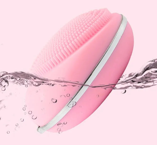 Ultrasonic electric face wash brush in pink for deep pore cleansing with vibration technology