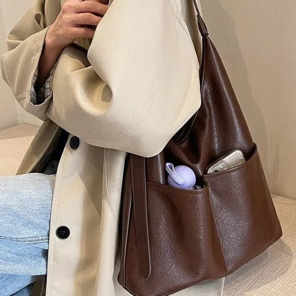 Women's large-capacity PU crossbody bag in coffee or black, 25cm high, 30cm wide, 12cm thick, with small bag.