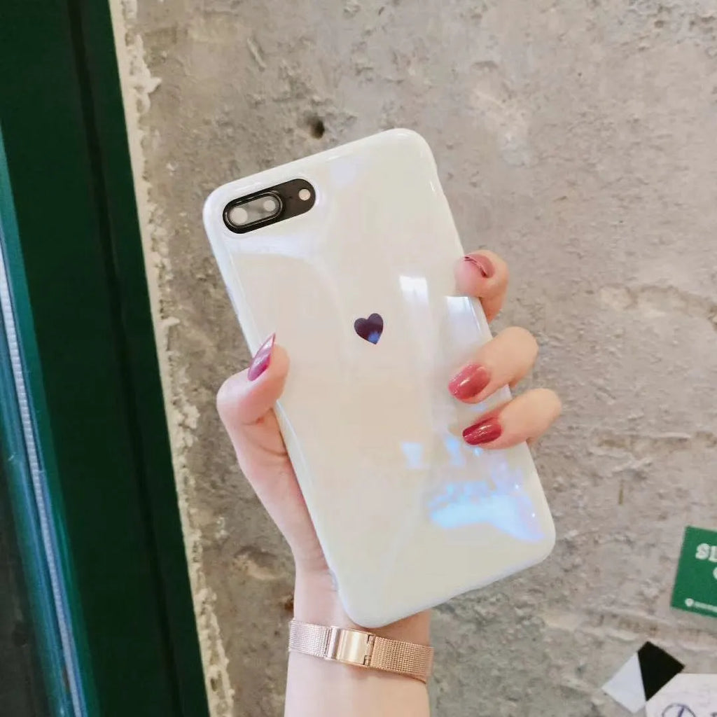 Slim white hard back cover case for iPhone X, shown next to a Bluwhite variant.