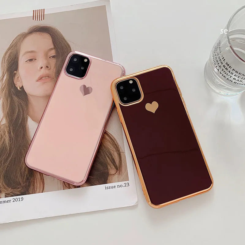 Simple solid colour TPU back cover case for iPhone on a table, shown in Blue.