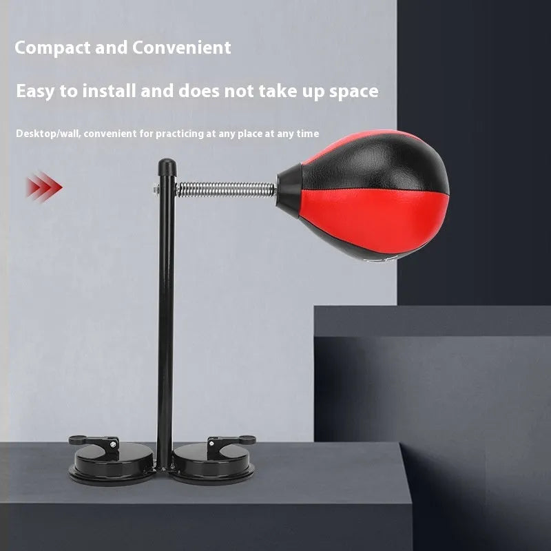 Pear-shaped inflatable boxing training ball with red and black head mounted via suction cups