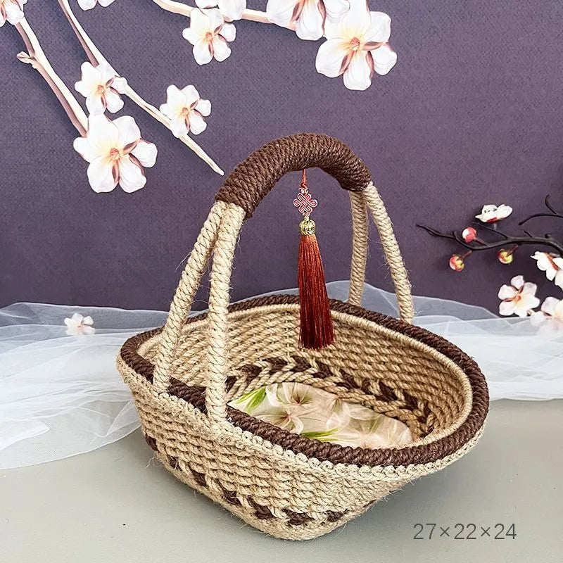 Hand-woven straw basket with hemp rope detailing in rustic coffee brown colour