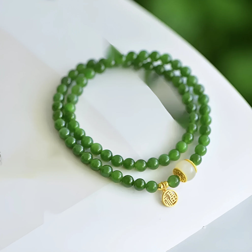 Double circle Hetian jade bracelet with geometric design and fu character elements