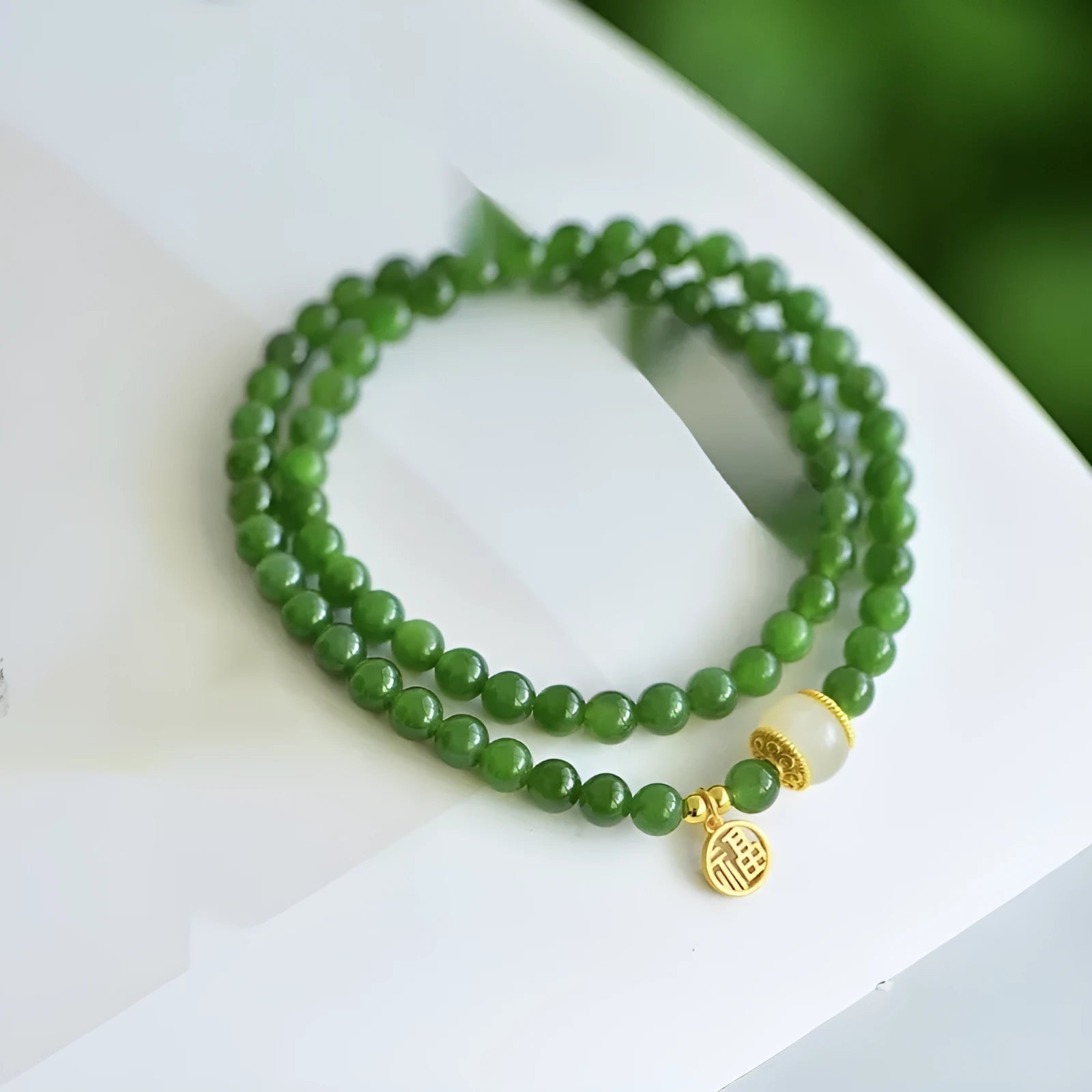 Double circle Hetian jade bracelet with geometric design and fu character elements