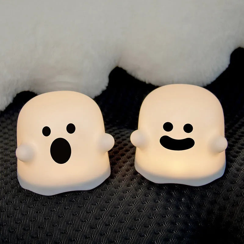 White silicone LED night light with touch sensor base and portable handheld design