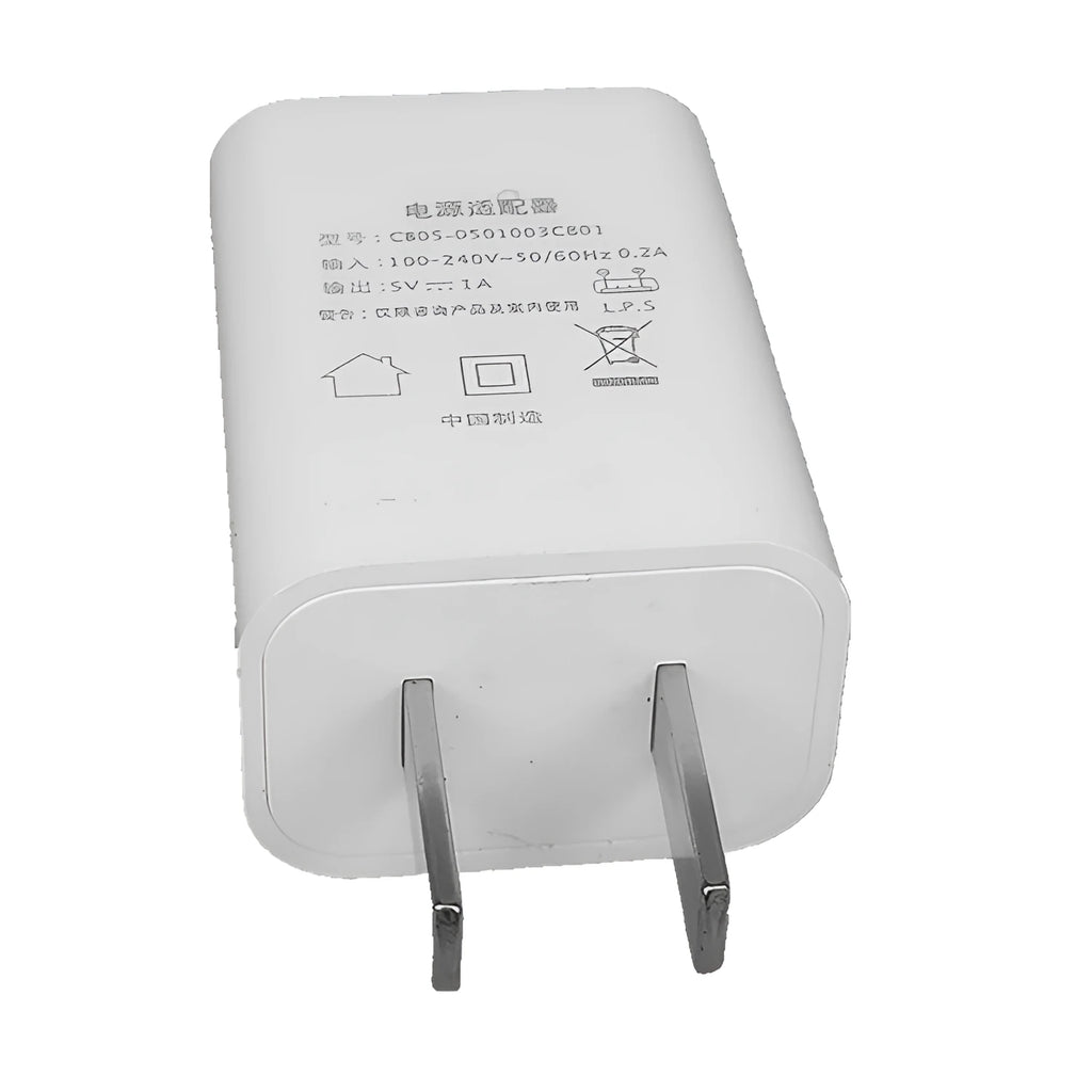 White slim USB charger with CE and FCC markings showing 5V-1A output specifications