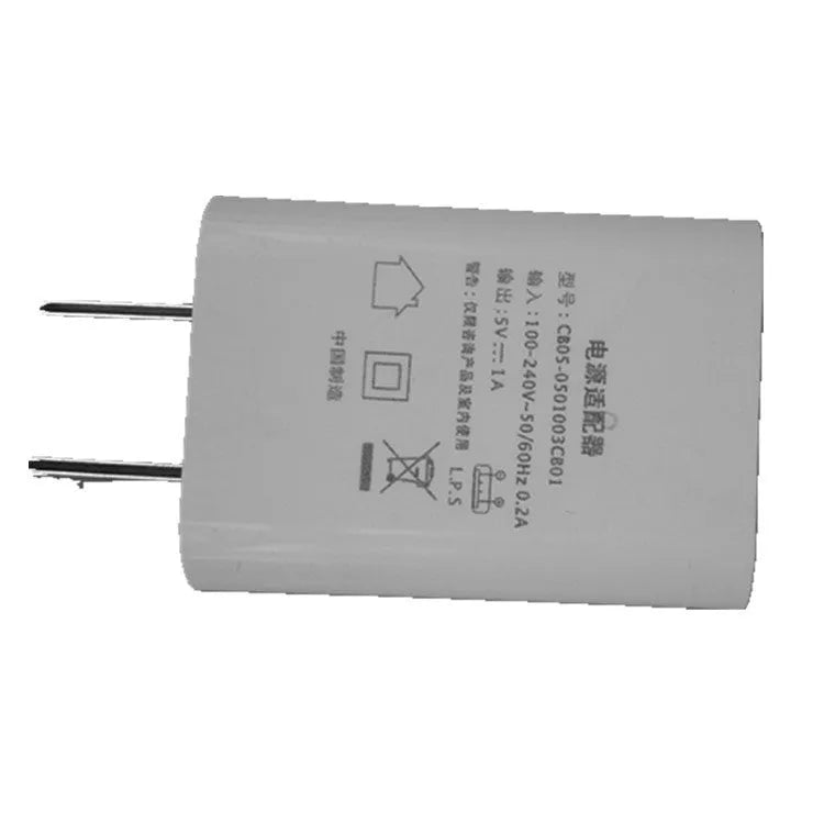 White slim USB charger with CE and FCC markings showing 5V-1A output specifications
