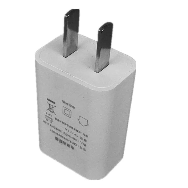 White slim USB charger with CE and FCC markings showing 5V-1A output specifications