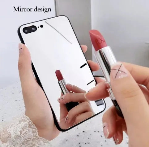 Black iPhone mirror phone case showing reflective surface on back, compatible with iPhone X and Plus models.