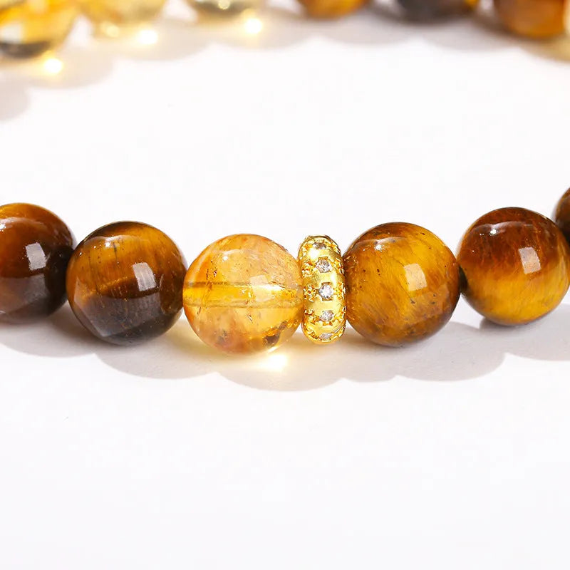 Yellow tiger-eye gemstone bracelet with 8mm round beads in a Jinba geometry design.